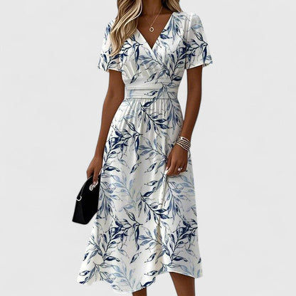 Elegant White Floral Midi Dress for Women with V Neck Flutter Sleeve Wrap Flowing Style