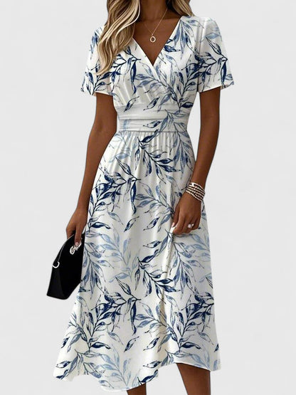 Elegant White Floral Midi Dress for Women with V Neck Flutter Sleeve Wrap Flowing Style
