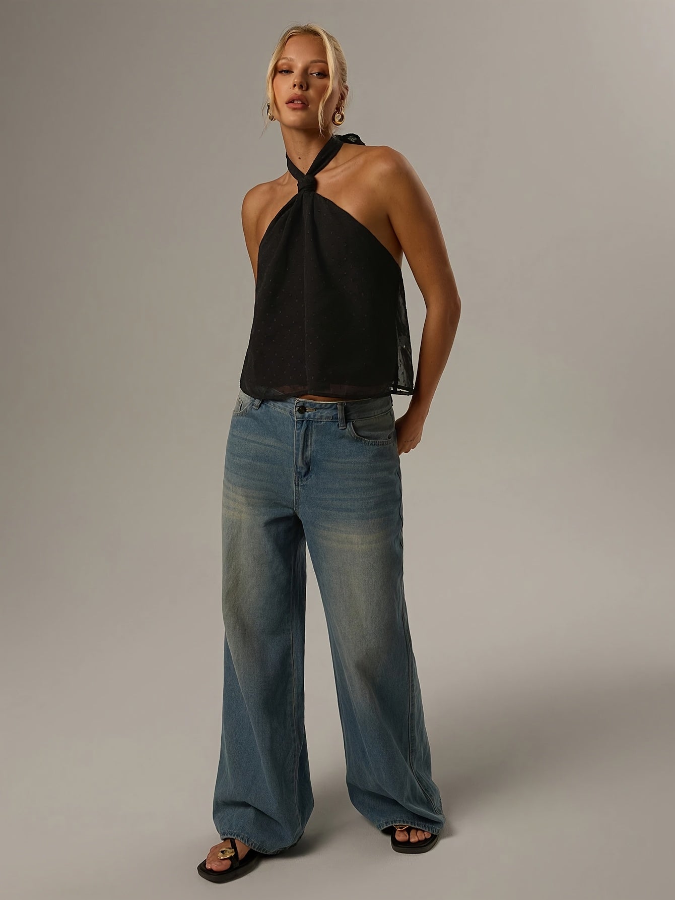 Elegant Black Swiss Dot Halter Top for Women with Twist Neck Open Back Cropped Flowing Style