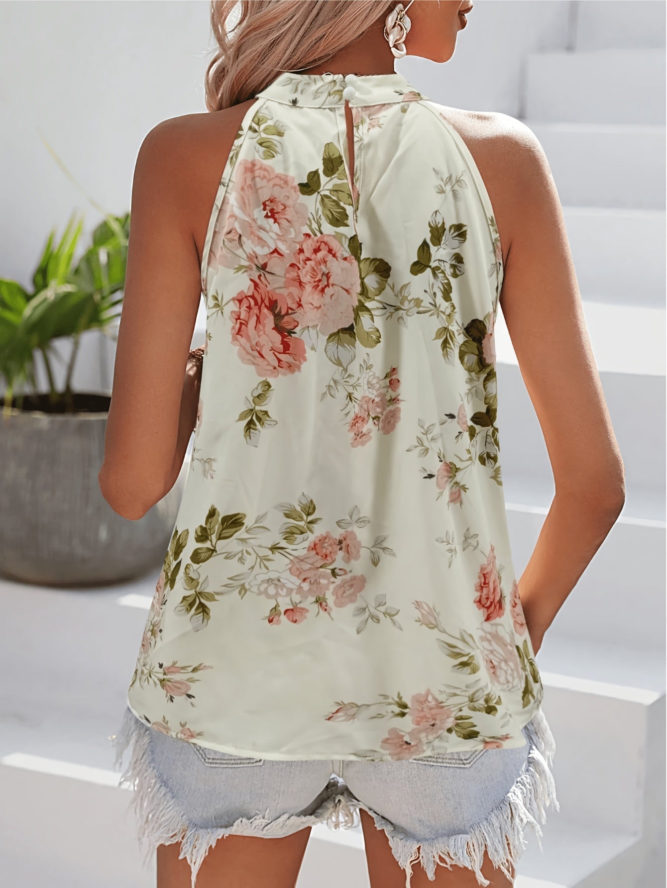 Effortless White Floral Blouse for Women with Halter Neck Sleeveless Pleated Flowing Style