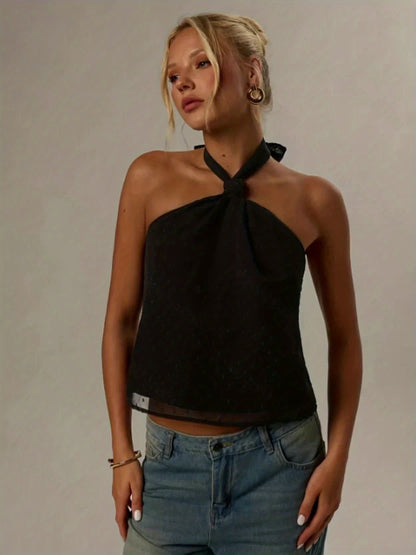 Elegant Black Swiss Dot Halter Top for Women with Twist Neck Open Back Cropped Flowing Style