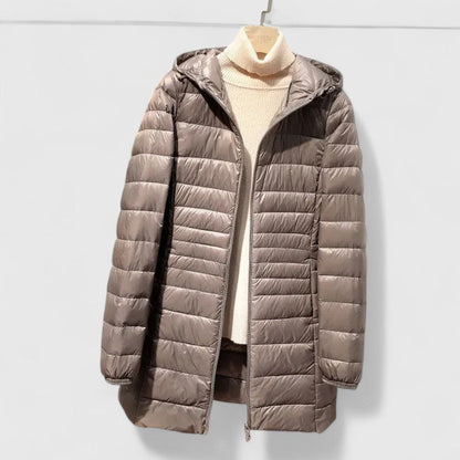 Effortless Quilted Puffer Jacket for Women with Hooded Long Sleeve Zip Front Longline Casual Style